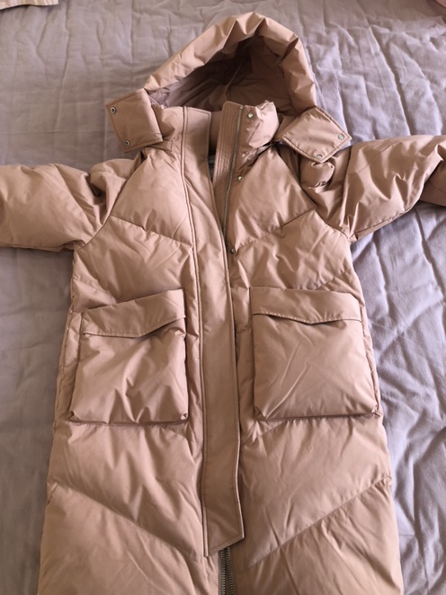 冬季保暖利器：中长款羽绒服