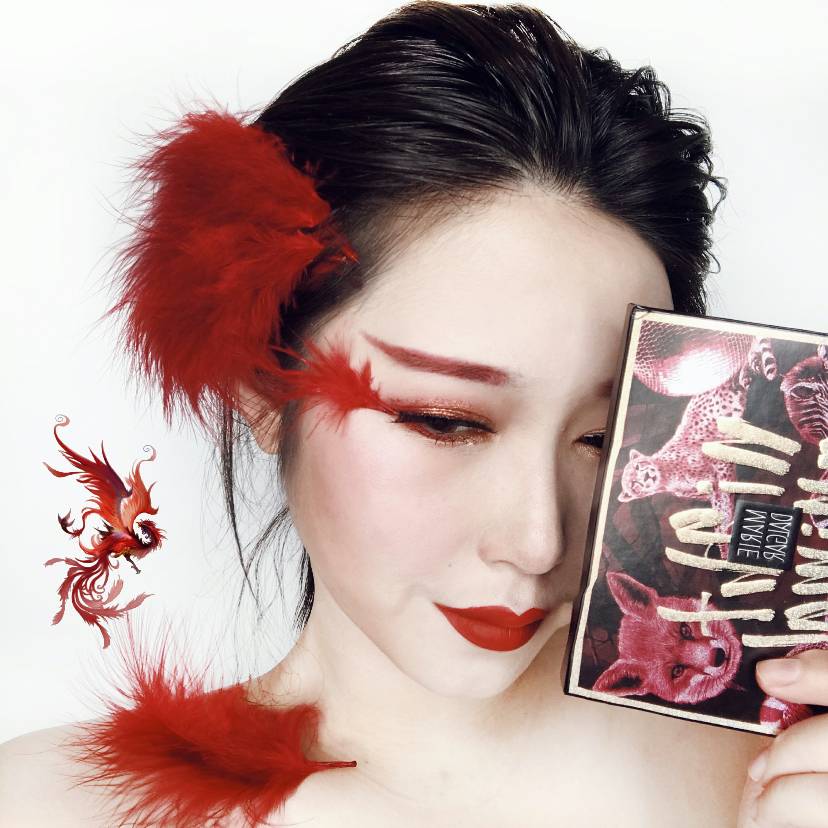 觉得配色真的太刺激了而且我没有红色盘 就想着一定要出一个朱雀妆